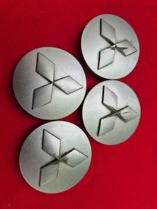 Products: Mitsubishi Triton Centre Cap Set - Secondhand, Accessory JCM Direct Tyres