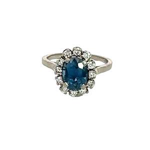 Jewellery Engagement Rings: Sapphire Diamond Halo Ring in 18ct White Gold