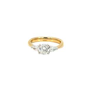 Jewellery Engagement Rings: Round and Pear Three Stone Diamond Ring
