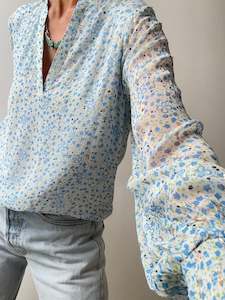 Promotion: Cliff Ruffle Top