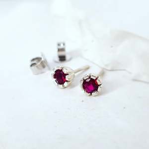 Ruby Studs in White Gold