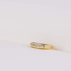 Local Jewellery: 18ct Gold Band with Diamond Accent