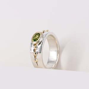 Engagement Rings: Oval Peridot 9ct Yellow Gold Mount on Silver Band Ring