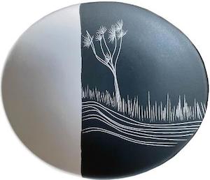 medium oval bowl: coastal tī kōuka dipped white on black
