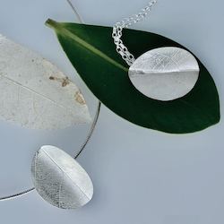 Ngaruru (new growth) silver pendant