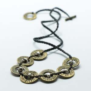 Lower Price Point Reticulated Brass: 7 piece Brass/Silver Āmionga Necklace