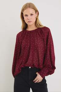 Products: Stories Be Told Cosmopolitan Burgundy Polka Dot Crew Neck Floaty LS Top