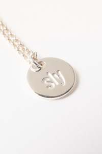 Sly pendant necklace