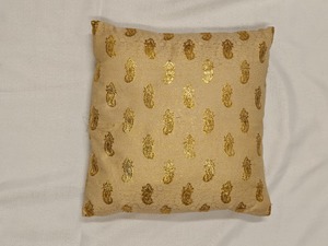 Hireage: Golden Paisley Elegance Cushion