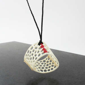 Artist Rachel Lambert: Red and Cream Holey Pendant