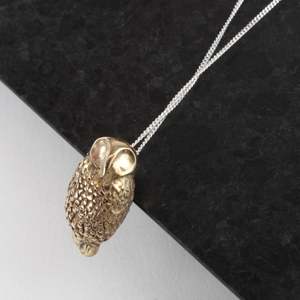 Ruru pendant bronze