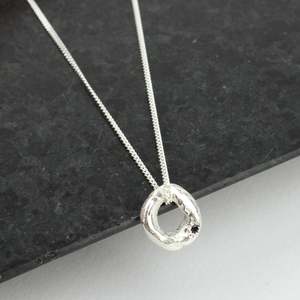 Sophie Divett: Small Circle Pendant with Blue Sapphire