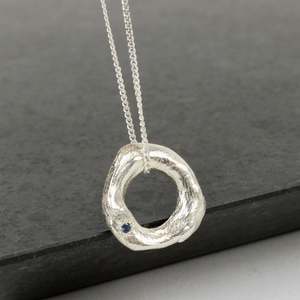 Sophie Divett: Large Circle Pendant with Sapphire