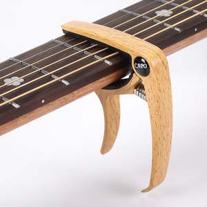 Books Music Movies: Acoustic Guitar Capo With Built In Pick Holder