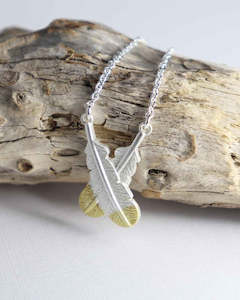 Crossed Huia Feather Necklace - Silver