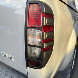 Nissan Navara D40: Taillight Covers Nissan Navara D40 2005-2015 Matte Black Thai
