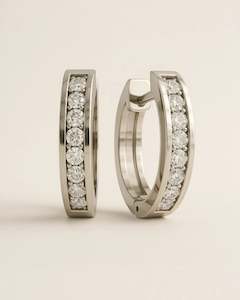 Earrings: Huggie Earrings with 0.17 Carat TW of Diamonds