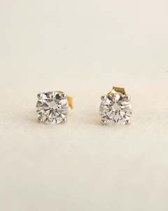 Frontpage: 0.50 Carat TW Lab-Grown Diamond Solitaire Stud Earrings in Yellow Gold