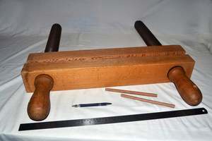 Frontpage: Book press -  vintage lying in press