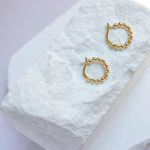 Gold All: Beaded circle earrings