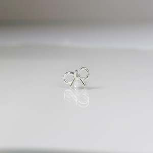 Silver Piercings All: Eternal bow piercing