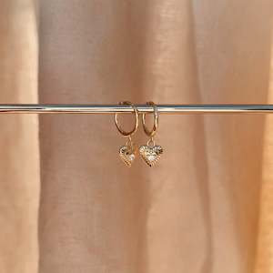 Earrings: Heart Ray Huggies