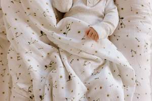 Swaddle Blankets: Muslin Swaddle Blanket | Daisy