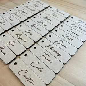 Laser engraved name tags Leo Design Studio