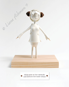 Products: Print: Holly puts on her earmuffs and silences her inner critics