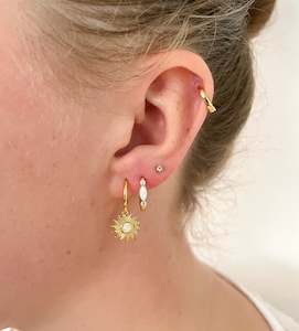 Crystal Earrings: Starburst Huggies Gold