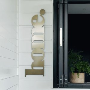 home wall word | bronze/pewter