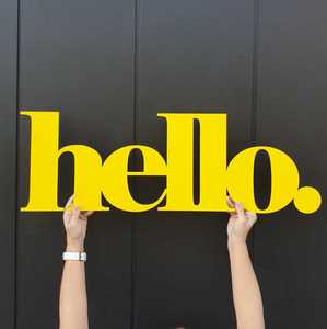 yellow hello sign