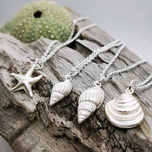 Necklaces: Erika Heidi Pendants