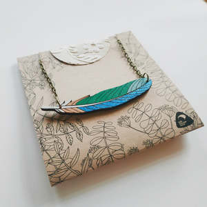 Necklaces: Tui feather necklace