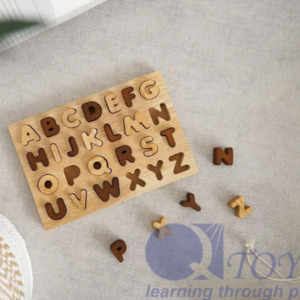 The Naturist: Q Toys |  Natural Capital Letter Puzzle