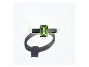 Charlie Lattimore 1: Emerald Cut Claw Set Peridot Ring