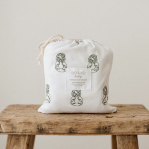 Te Reo Maori: Fitted Cot Sheet | Tiki Green
