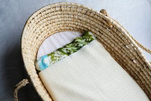 Baby blanket - green patterned silk binding, 100% NZ Merino wool