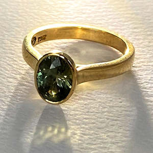 Engagement Ring: Green Sapphire Rub-over Ring