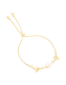 White: Gold Plated Cubic Zirconia Acrylic Flower Toggle Bracelet