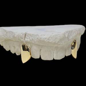custom made grillz: Two teeth in 9kt Gold
