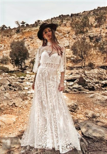 Products: Discover the stunning Krissy White April a slim a line lace wedding dress with sheer jacket Madison Rose Bridal