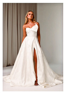 Products: Ginger - TC25142 - Tania Olsen Make a bold but graceful statement in our modern Ginger wedding gown - In Madison Rose Bridal