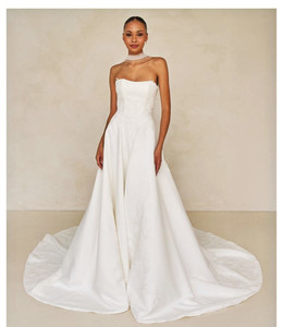Wendall - ML25955 - Madi Lane a wedding dress that is designed for the minimalis&hellip;