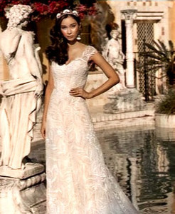 Discover Brinley a vintage glamour slim a line wedding dress with low back. ON S&hellip;