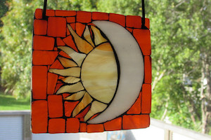 Orange sun and moon stained glass mosaic suncatcher Mainlymosaics