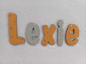 Door name: Lexie - small letters suitable for a door.