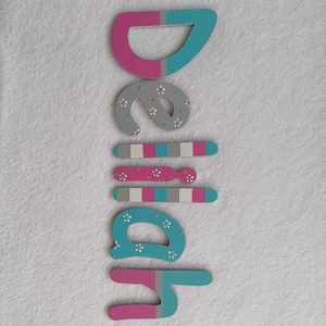 8 Names Suitable For Doors: Delilah - small letters suitable for a door.