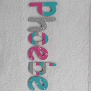 8 Names Suitable For Doors: Phoebe - small letters suitable for a door.