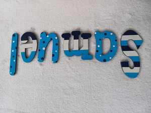 8 Names Suitable For Doors: Samuel - small letters suitable for a door.